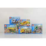 Five boxed Lego City models, including Bus Station 60154 unopened, Pizza Van 60150 unopened, Cargo