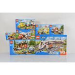 Seven boxed Lego City models, including High Speed Passenger Train 60051 unopened, Pickup and