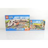 Two boxed Lego City models, High Speed Passenger Train 60051, unopened and Bus Station 60154,