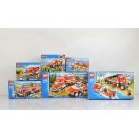 Six boxed Lego City models, including Off Road Fire Truck and Fire Boat 7213 opened with manual