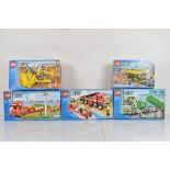 Five boxed Lego City models, including Bus Station 60154 opened with manual and unchecked, Off