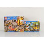 Two boxed Lego City models, including Mining Experts Site 60188 and Jungle Mobile Lab 60160 box af