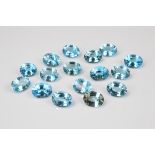 A collection of sixteen oval mixed cut loose topaz, blue and brown in colour, 177ct (16)