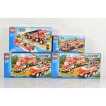 Four boxed Lego City models, including two x City Fire Transporter 4430 opened with manuals and