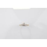 A certificated 9ct gold diamond wishbone ring, the brilliant cut diamonds in claw settings on a