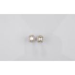 A pair of certificated diamond cluster ear studs, the emerald cuts in four claw settings