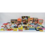 A large collection of 1980s and 1990s hand held gaming devices, including three Tiger Electronic