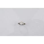 A platinum diamond solitaire ring, brilliant cut diamond in six claw setting, diamond 1.04ct, colour