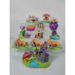 A collection of Polly Pocket by Blue Bird houses, cottages, castles, Disney castles, treasure