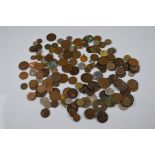 A small quantity of British, world and Commonwealth loose coinage, including a large brass Chinese