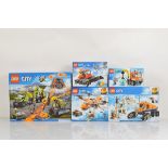 Five boxed Lego City models, including Snow Groomer 60222 unopened, Arctic Scout Truck 60194