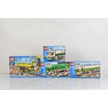 Four boxed Lego City models, including Bus Station 60154 opened with manuals unchecked, Tank Truck