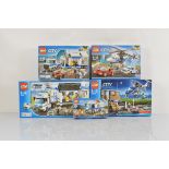 Five boxed Lego City models, including Money Transporter 60142 unopened, Mobile Police Unit 7288