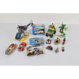 A collection of unboxed and unchecked Lego City, including Volcano Exploration Truck 60121 with