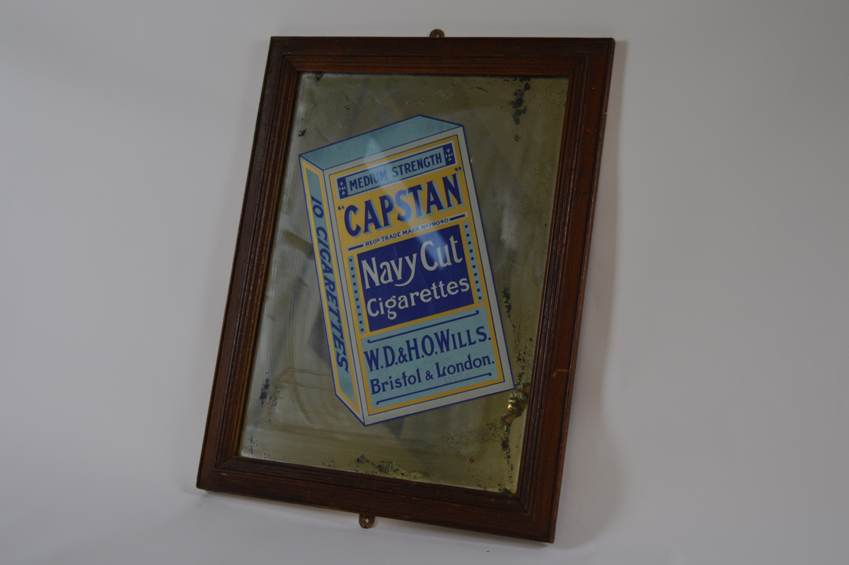 An early 20th century Wills Cigarette's Capstan Navy Cut advertising mirror, 49cm x 36cm.