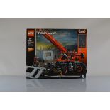 A boxed Lego Technic Rough Terrain Crane, 42082, with fold out sleeve, unopened having sealed sides