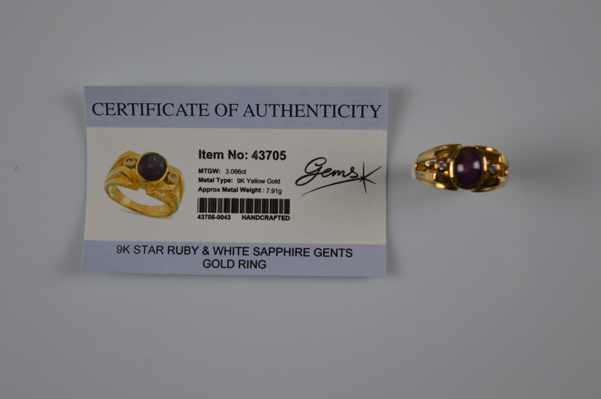 A certificated 9ct gold star ruby and white sapphire gentleman's dress ring, the central cabochon - Image 2 of 2