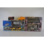 A mixed lot of model vehicles including, two Revell Metal 1:24 scale trucks, an unboxed Tonka tipper