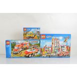 Three boxed Lego City models, all unopened, Fire Station 60110, Service Truck 60073 and Fire