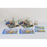 A collection of unboxed and unchecked Lego City, including two Service Station 7993 models with