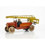 A Distler Tinplate Clockwork Fire Engine, detailed tinrpinted toy with two firemen, 'Continental