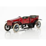 A Carette 1920s Tinplate Clockwork Open Tourer, tin lithographed open tourer, dark red body, black