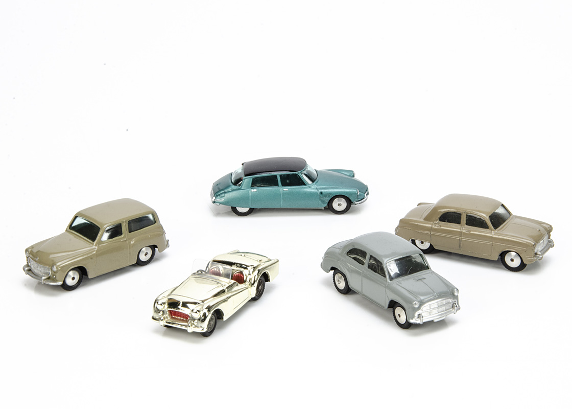 Early-Issue Corgi Toys, 200 Ford Consul, fawn body, 202 Morris Cowley, grey body, 206 Hillman Husky,