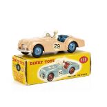 A Dinky Toys 111 Triumph TR2 Sports, competition finish, salmon pink body, blue interior and hubs,