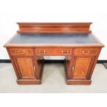 Mahogany kneehole leather topped writing desk, with inlaid edging and decoration, one central drawer