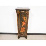 An early 20th Century lacquered Chinoiserie cabinet, narrow body with a single panelled door, two