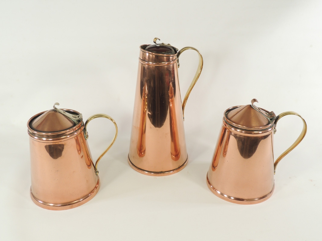 A W.A.S. Benson William Arthur Smith Benson (1854-1924) copper and brass jug of tapering cylindrical