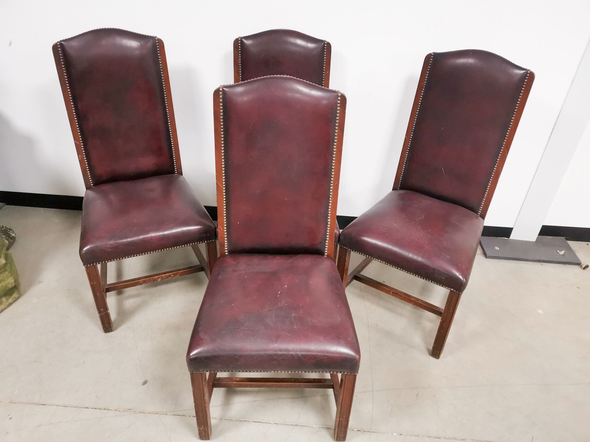Set of four modern dark red leatherette chairs, 53cm W x 57cm D x 110cm H