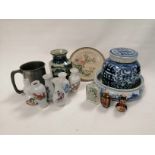 A quantity of Asian collectables, to include a blue and white covered jar with a profusion of