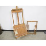 A hardwood all purpose easel, manufactured by Guys height 130cm