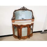 19th Century mirror backed marble topped credenza, with shaped form, foliate scroll decoration to