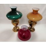 Two 20th Century brass oil lamp bases, one 'Aladdin' the other 'Duplex', together with three retro