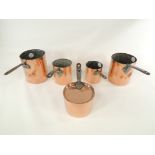 Five late 19th or early 20th Century copper saucepans in various sizes, one with visible Benham &