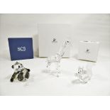 A small group of three Swarovski crystal figures, to include a squirrel, a panda and giraffe, height