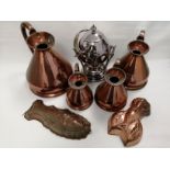 A group of four graduated copper jugs 'gallon', 'half gallon', 'quart' and 'pint', the tallest