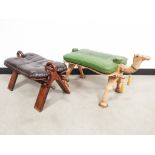 Two wooden camel stools, one in the form of a camel with green leather cushion, 87cm W x 42cm D x