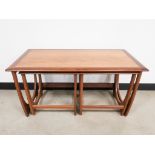A nest of G-plan coffee tables, one rectangular with two smaller sided under tables, supported on