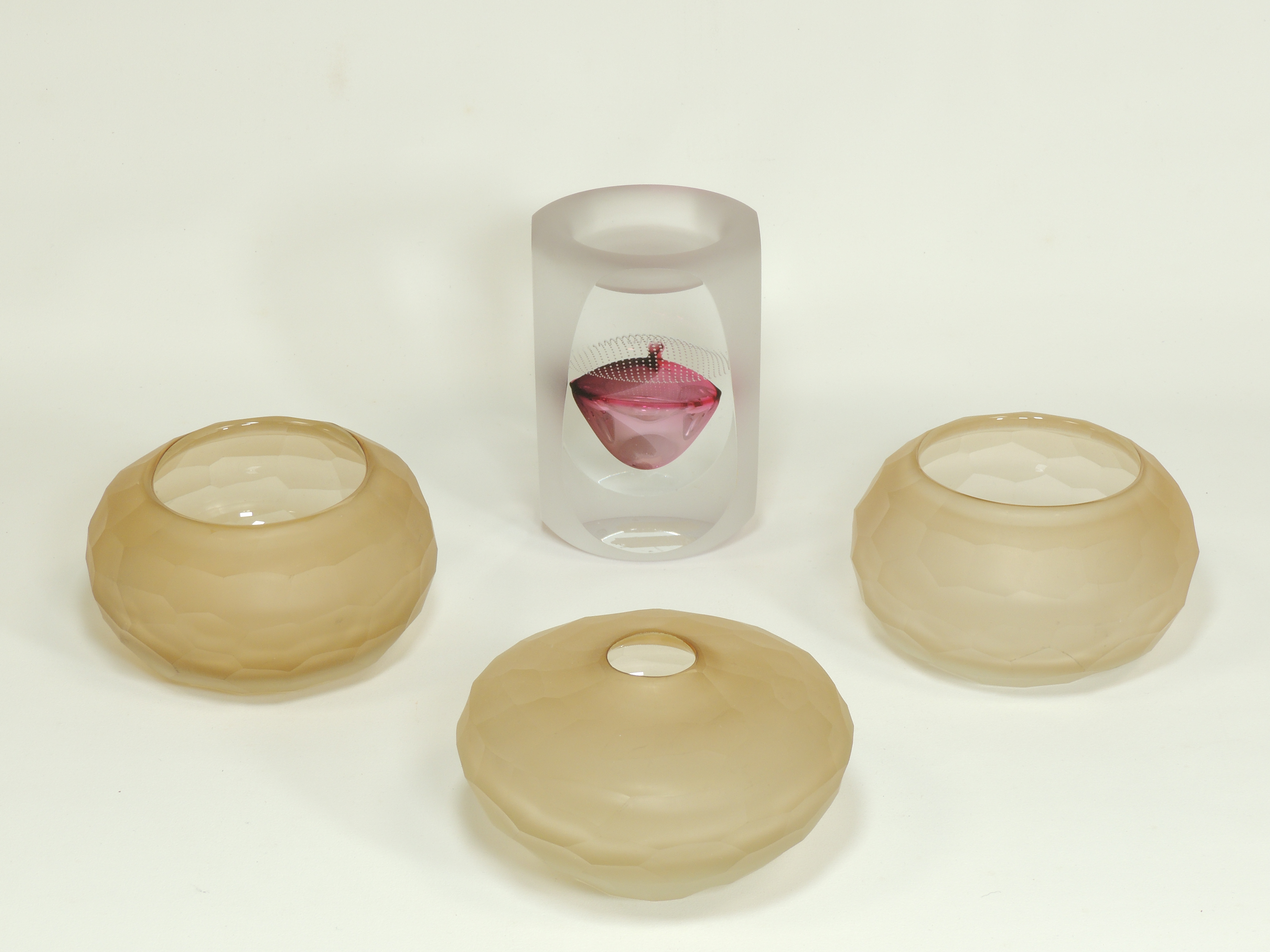 Three pieces of 20th Century Rosenthal opaque multifaceted glass, together with a glass