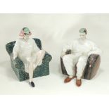 A pair of mid to late 20th Century moulded ceramic figures seated in armchairs, staring directly