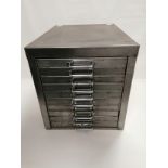 A mid 20th Century metal table top cabinet, with ten drawers, 30cm x 38cm x 39cm