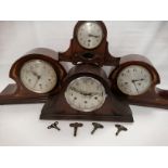 Two 20th Century mahogany cased Napoleon hat shaped clocks, each with inlaid decoration and dials