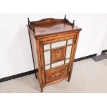 An Edwardian inlayed rosewood mirrored music cabinet with neo-classical inlay decoration, missing