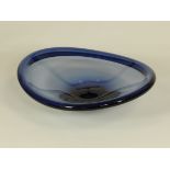 Per Lütken (1916-1996) for Holmegaard, a blue glass bowl a selandia dish of misshapen flowing