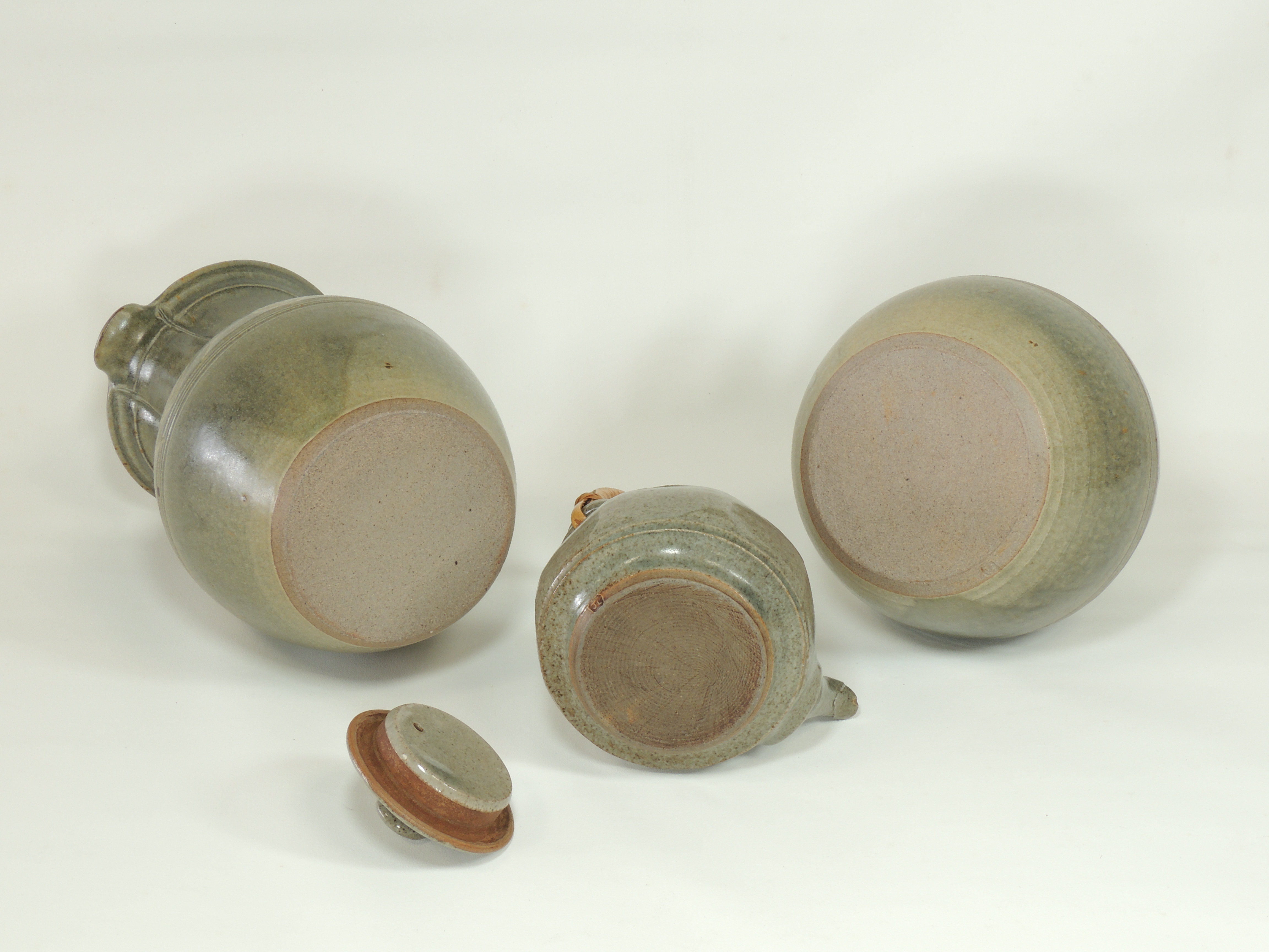 Three items of 20th Century studio pottery with green glaze speckled with marks of oxidisation, - Image 3 of 5