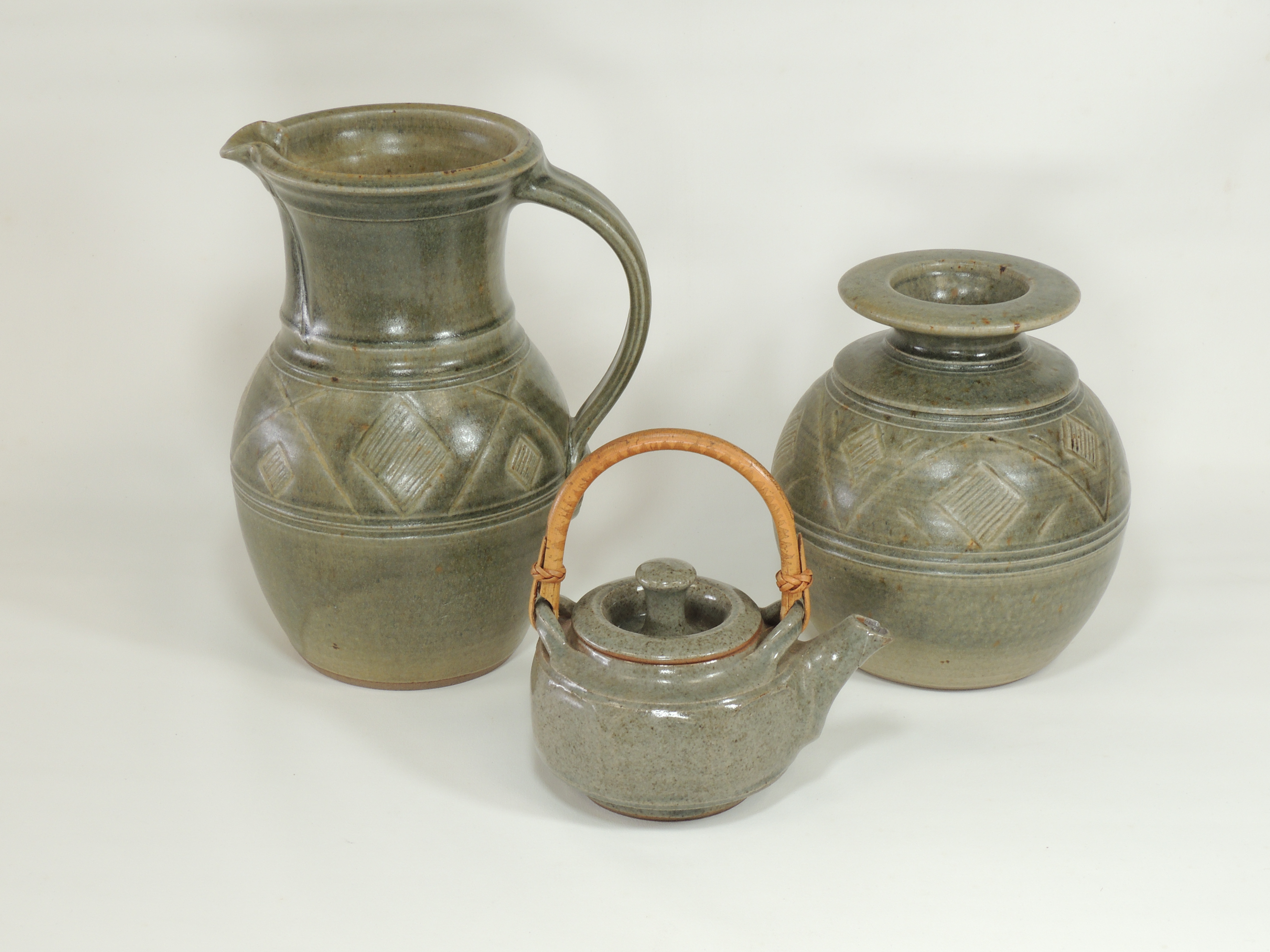 Three items of 20th Century studio pottery with green glaze speckled with marks of oxidisation, - Image 2 of 5