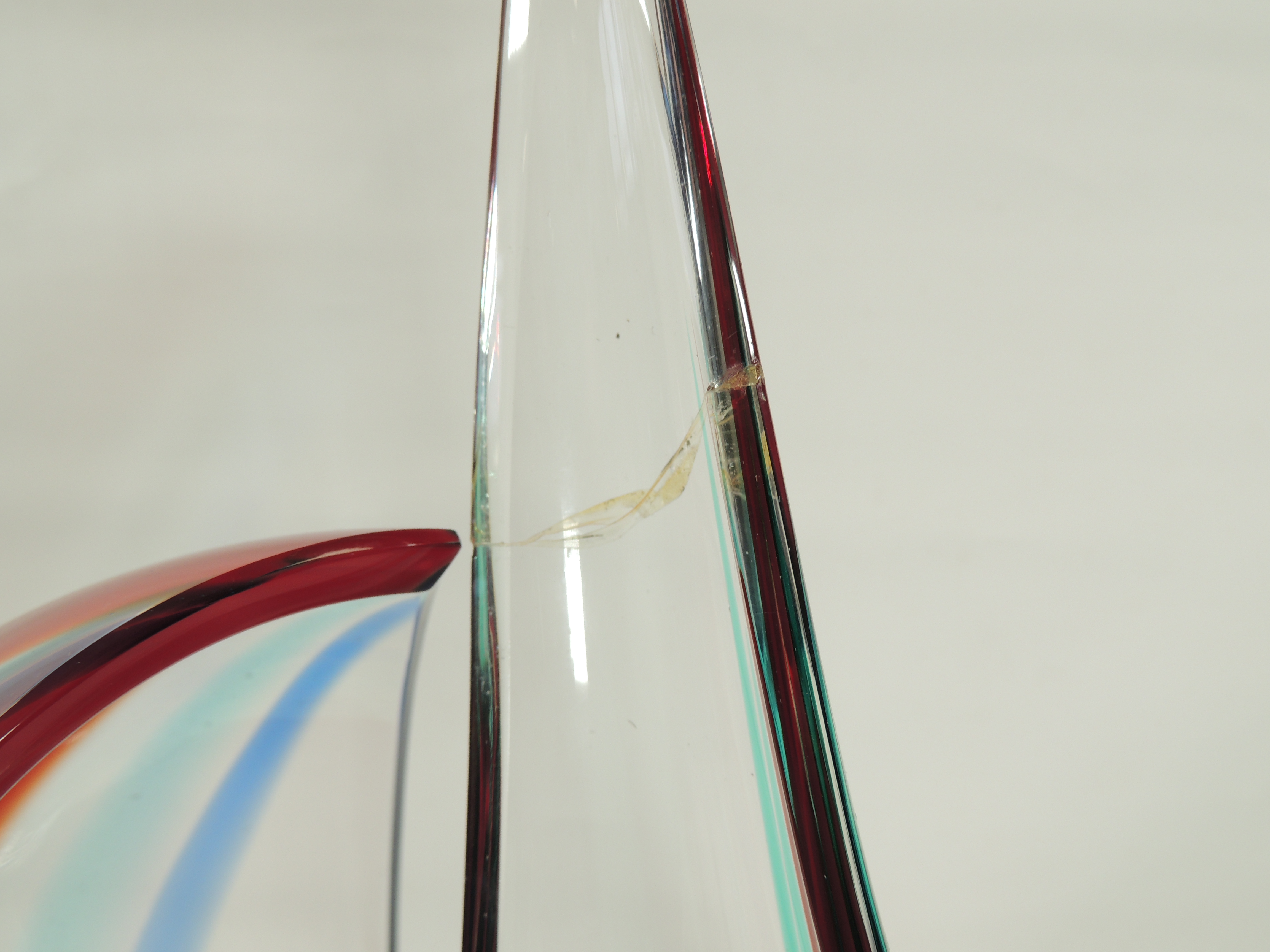 An Italian Murano glass sculpture of a sailing boat, with encased red, blue and green colouration, - Image 3 of 5